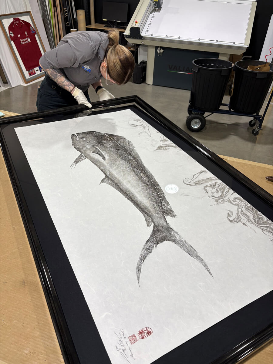 Picture framer Danni framing Gyotaku art