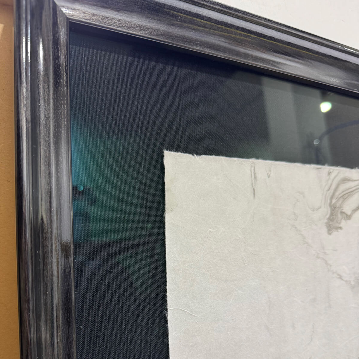 Detailed view of Leon Black picture frame moulding