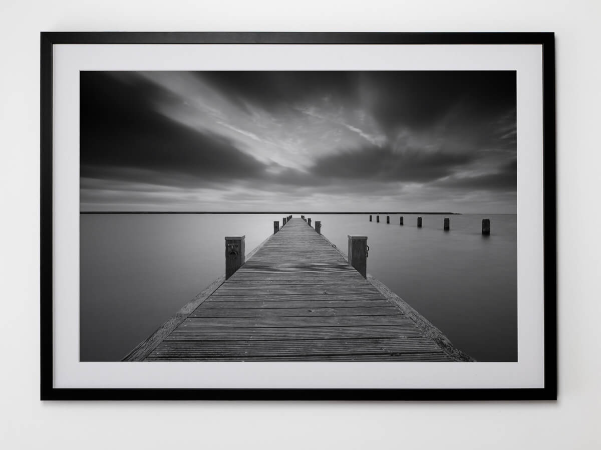 Professionally framed photo art Professional black and white photo with white mat and black frame