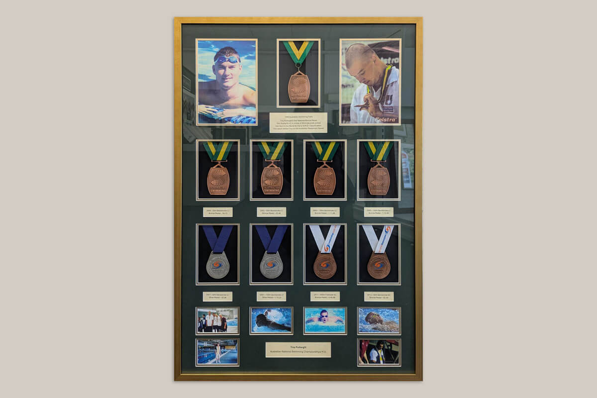 Troy Puttergill framed paralympic medals  