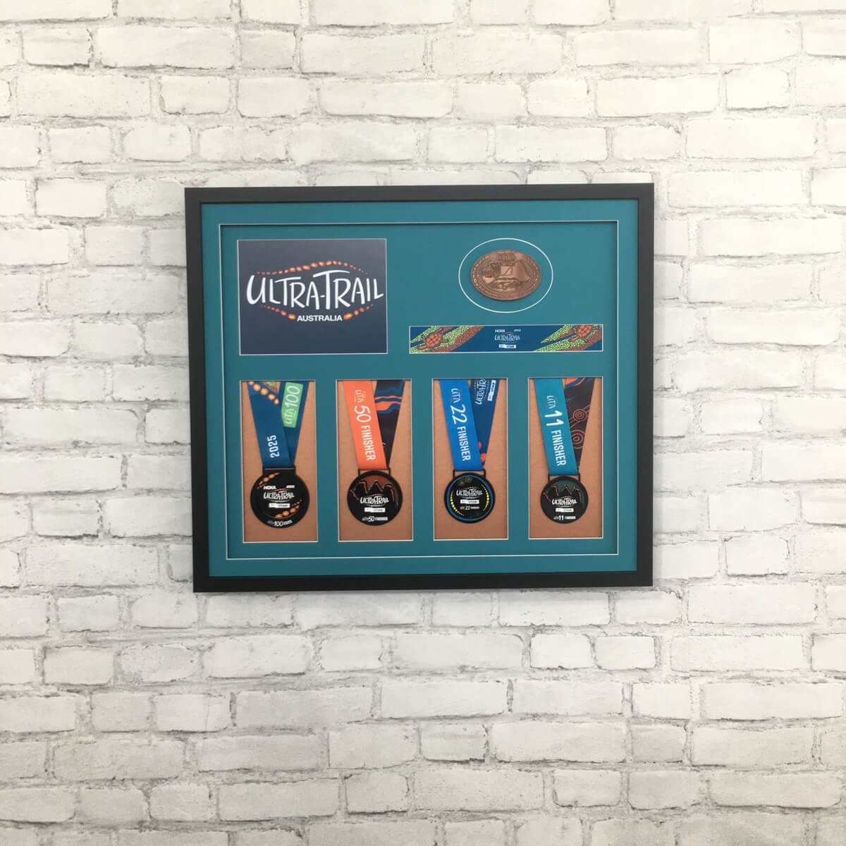 Framed marathon medals